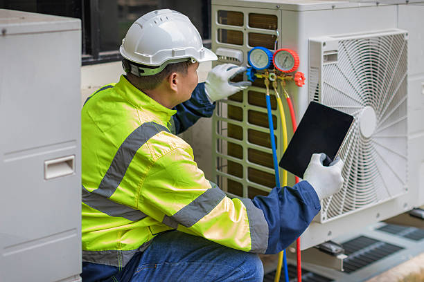 Professional Heat Pump Repair technician working in Sumner, IL
